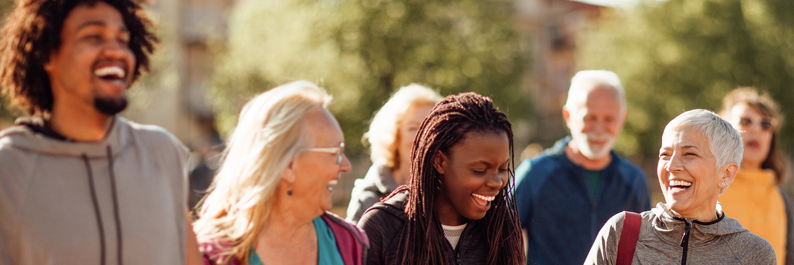 community members walking and laughing together
